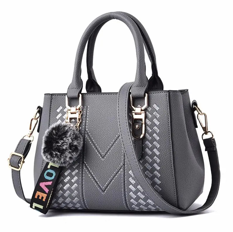 Leather embroidery messenger bag with stylish design, spacious handbag, and chic hair ball detail – perfect everyday sac à main. - WAREHOUSE SHOP