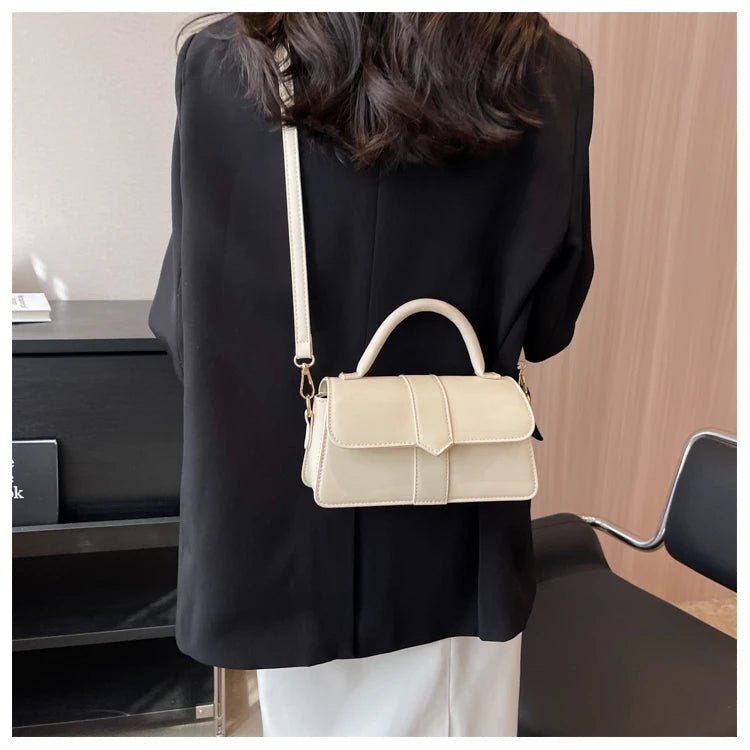 Women’s PU leather shoulder bag in black – versatile square satchel with vintage design, crossbody style, and chic underarm fit. - WAREHOUSE SHOP