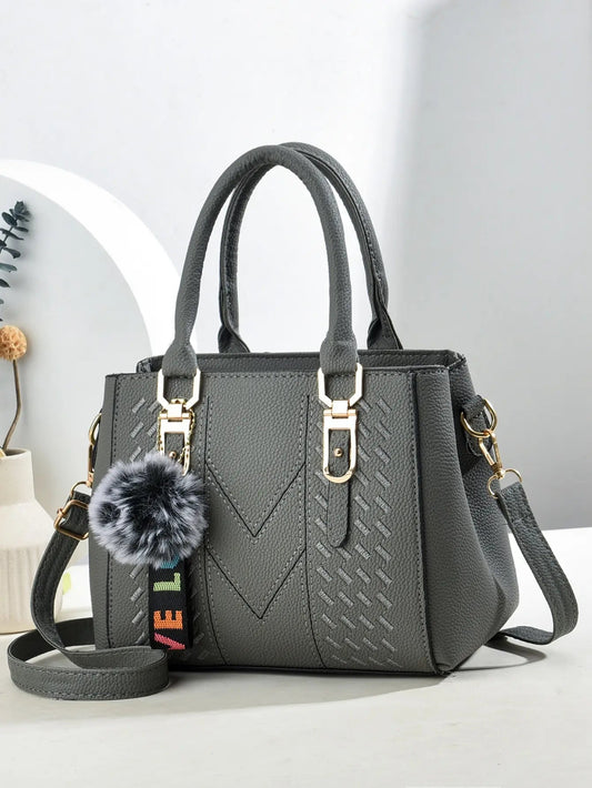 A Stylish embroidered crossbody bag for women. Ladies large capacity handbag for daily use, social and official moments. WAREHOUSE SHOP
