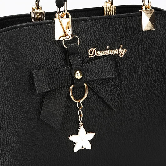 Chic shoulder bag for women featuring a bowknot accent, spacious compartments, and versatile style for work, outings, or daily wear. - WAREHOUSE SHOP