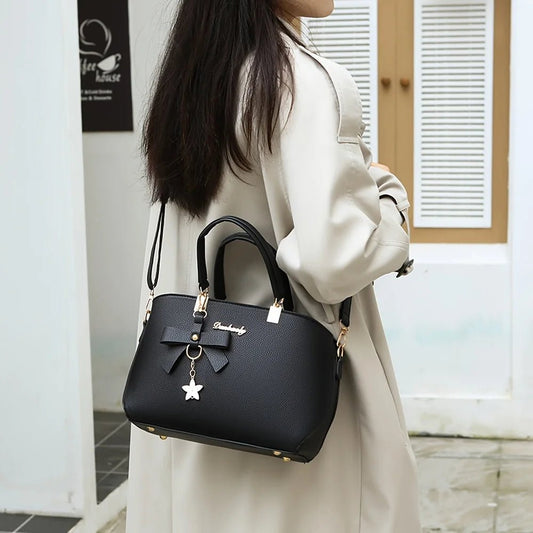Chic shoulder bag for women featuring a bowknot accent, spacious compartments, and versatile style for work, outings, or daily wear. - WAREHOUSE SHOP
