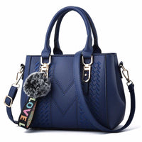 Leather embroidery messenger bag with stylish design, spacious handbag, and chic hair ball detail – perfect everyday sac à main. - WAREHOUSE SHOP