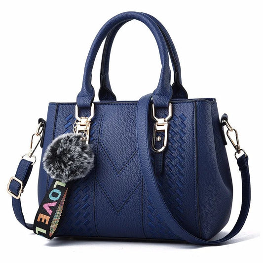 Leather embroidery messenger bag with stylish design, spacious handbag, and chic hair ball detail – perfect everyday sac à main. - WAREHOUSE SHOP