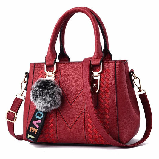 Leather embroidery messenger bag with stylish design, spacious handbag, and chic hair ball detail – perfect everyday sac à main. - WAREHOUSE SHOP
