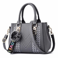 Leather embroidery messenger bag with stylish design, spacious handbag, and chic hair ball detail – perfect everyday sac à main. - WAREHOUSE SHOP