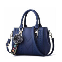 Leather embroidery messenger bag with stylish design, spacious handbag, and chic hair ball detail – perfect everyday sac à main. - WAREHOUSE SHOP
