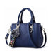 Leather embroidery messenger bag with stylish design, spacious handbag, and chic hair ball detail – perfect everyday sac à main. - WAREHOUSE SHOP