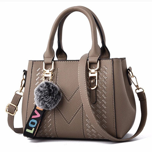 Leather embroidery messenger bag with stylish design, spacious handbag, and chic hair ball detail – perfect everyday sac à main. - WAREHOUSE SHOP