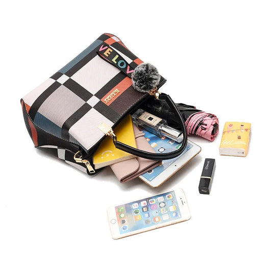 Stylish women’s designer handbag in PU leather with hairball detail, versatile crossbody and top - handle design, perfect for daily use. - WAREHOUSE SHOP