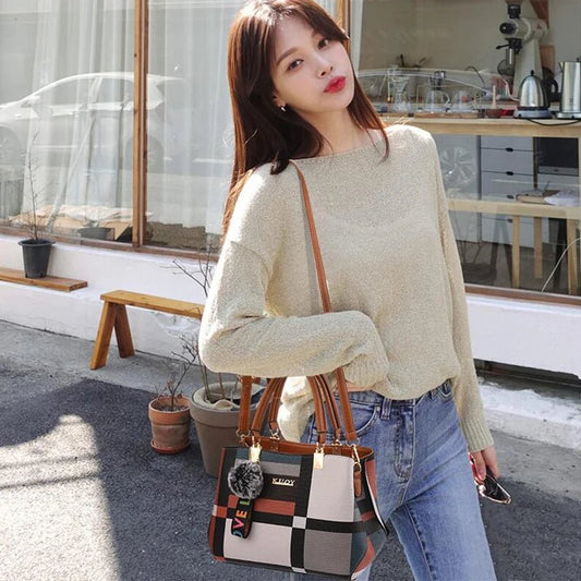 Stylish women’s designer handbag in PU leather with hairball detail, versatile crossbody and top - handle design, perfect for daily use. - WAREHOUSE SHOP