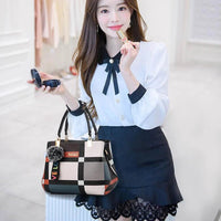 Stylish women’s designer handbag in PU leather with hairball detail, versatile crossbody and top - handle design, perfect for daily use. - WAREHOUSE SHOP