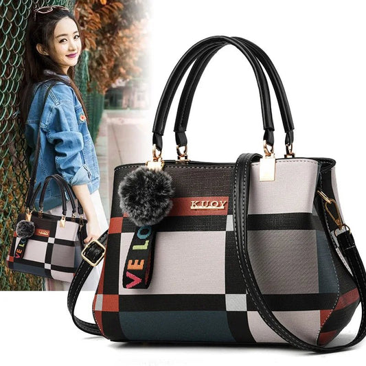 Stylish women’s designer handbag in PU leather with hairball detail, versatile crossbody and top - handle design, perfect for daily use. - WAREHOUSE SHOP