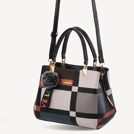 Stylish women’s designer handbag in PU leather with hairball detail, versatile crossbody and top - handle design, perfect for daily use. - WAREHOUSE SHOP