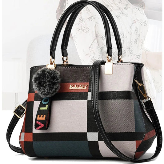 Stylish women’s designer handbag in PU leather with hairball detail, versatile crossbody and top - handle design, perfect for daily use. - WAREHOUSE SHOP