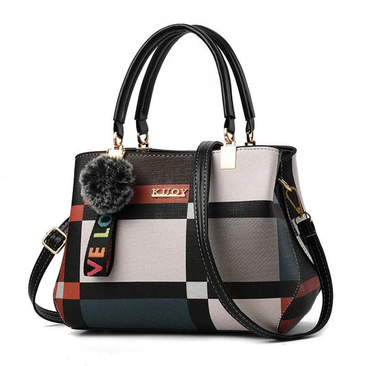 Stylish women’s designer handbag in PU leather with hairball detail, versatile crossbody and top - handle design, perfect for daily use. - WAREHOUSE SHOP