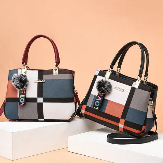 Stylish women’s designer handbag in PU leather with hairball detail, versatile crossbody and top - handle design, perfect for daily use. - WAREHOUSE SHOP