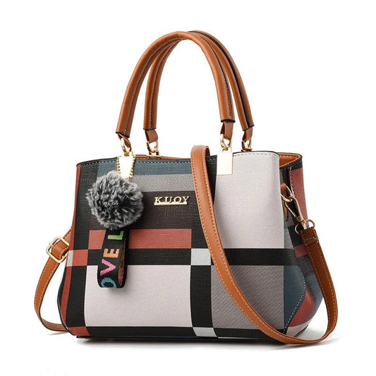Stylish women’s designer handbag in PU leather with hairball detail, versatile crossbody and top - handle design, perfect for daily use. - WAREHOUSE SHOP