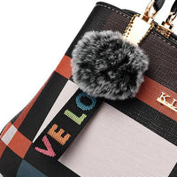 Stylish women’s designer handbag in PU leather with hairball detail, versatile crossbody and top - handle design, perfect for daily use. - WAREHOUSE SHOP