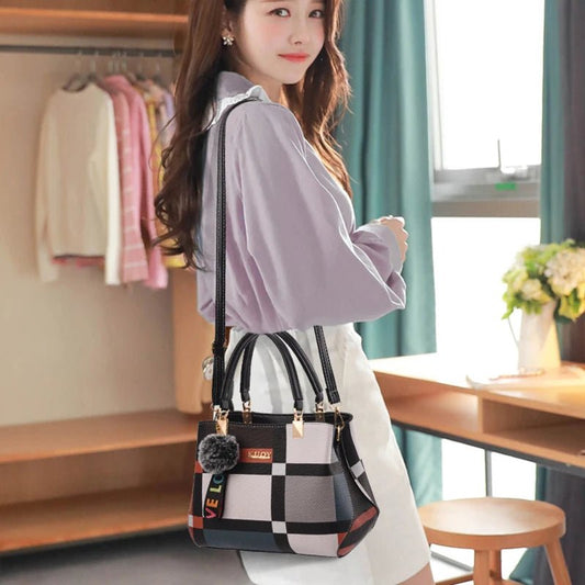 Stylish women’s designer handbag in PU leather with hairball detail, versatile crossbody and top - handle design, perfect for daily use. - WAREHOUSE SHOP