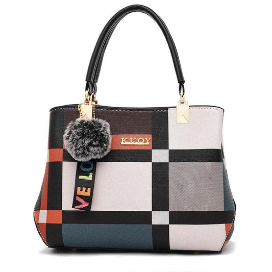 Stylish women’s designer handbag in PU leather with hairball detail, versatile crossbody and top - handle design, perfect for daily use. - WAREHOUSE SHOP